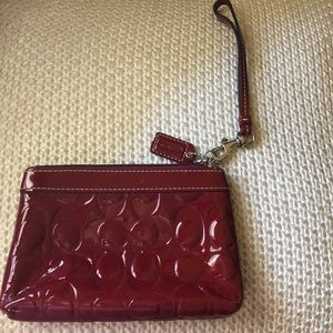 Burgundy coach wristlet